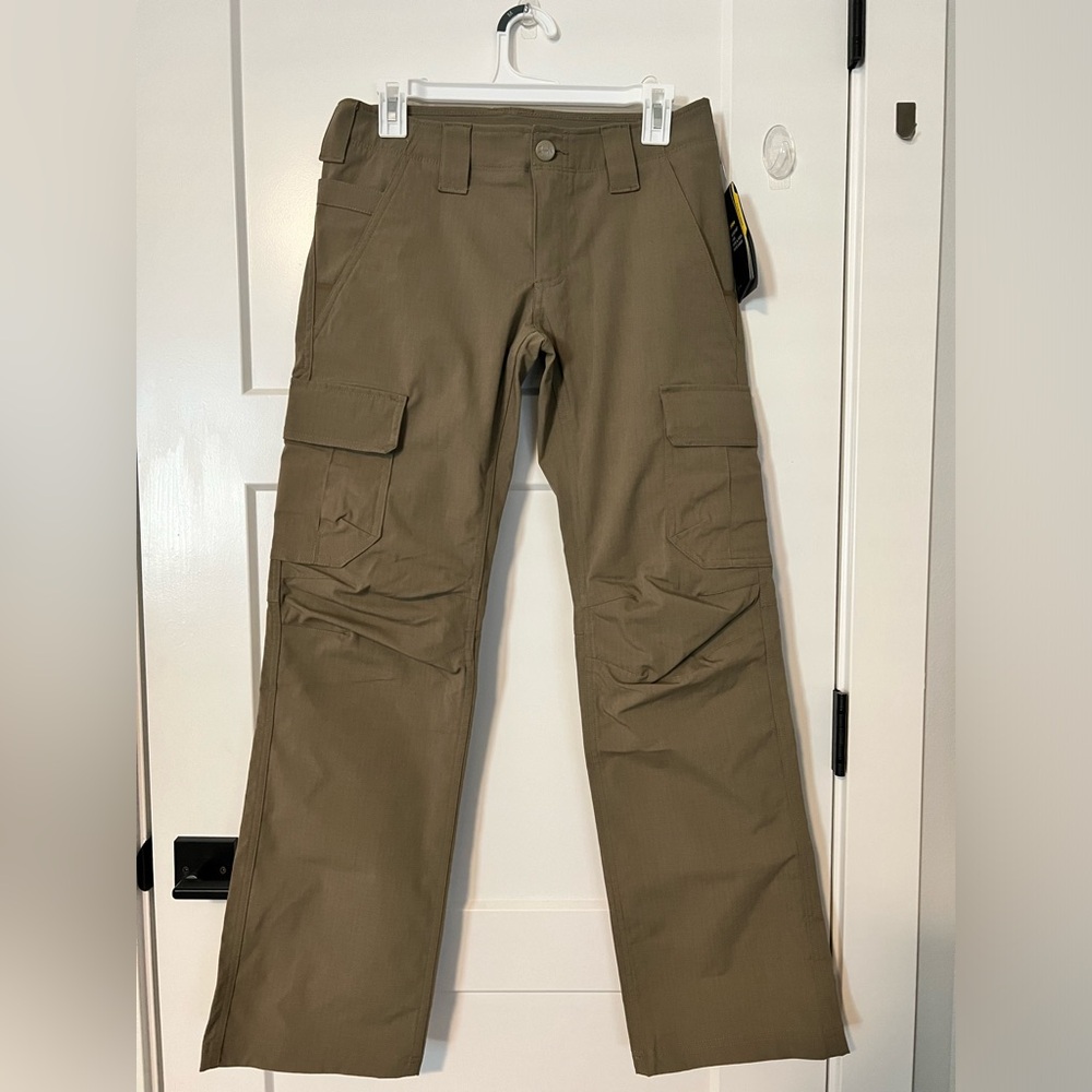 Green women’s under armour utility pants.